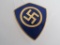 German World War II Swastika Shield Lapel Badge.