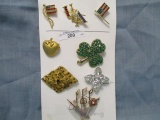 Card of 8 costume jewelry pins including Eisenberg Ice and 3 Patriotic pins