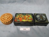 3 Russian boxes as shown- 2 laquered and 1 hand carved