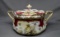 RS Prussia stipple mold cracker jar in red trim w/ yellow roses. Does have
