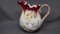 Early years melon mold milk pitcher w/ red trim and florals