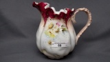 Early years melon mold milk pitcher w/ red trim and florals