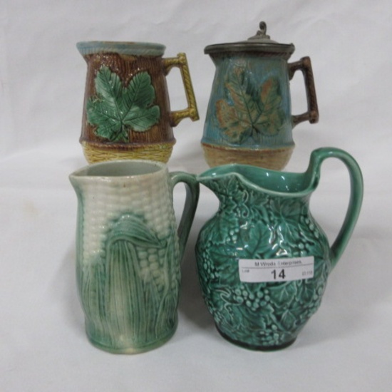 4 Majolica pitchers and syrup