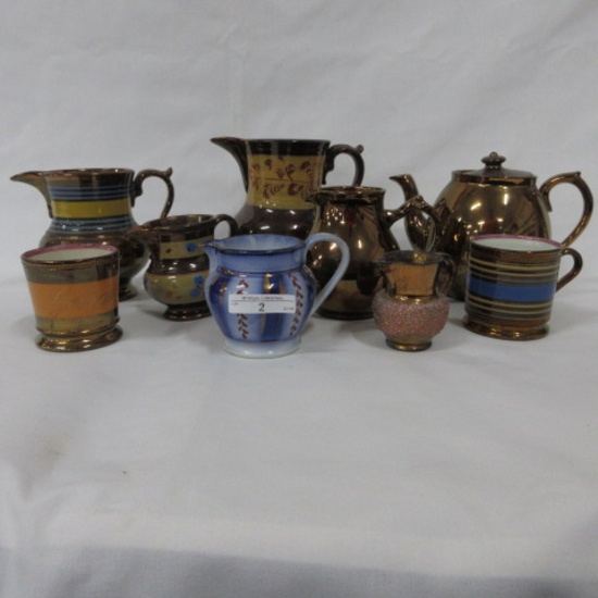 Tray of lustre ware pitchers (9pcs)