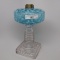 #1 stand lamp in Seaweed pattern, blue opal font with clear stem in Optic p