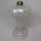 #1 stand lamp in Eason pattern with white opal font with clear stem and bas