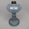 #1 stand lamp by Nickel Plate with opal. Stripe font and blue stem and base