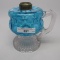 #1 footed finger lamp in King Melon pattern with blue opal Coin Spot font c