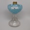 #1 stand lamp in Alva pattern white opal Coin Spot in blue font with clear