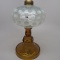 #1 stand lamp, white opal Coin Spot font with amber base and stem. Stem is