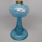 #2 stand lamp in Leaf and Jewel pattern. Blue opal font with open windows a