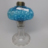 #1 stand lamp in Snow Flake pattern with blue opal font and clear stem and