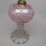 #1 stand lamp in Sheldon Swirl pattern with cranberry spatter opal font wit