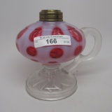 #1 footed finger lamp in Polka Dot pattern with opal cranberry font clear h
