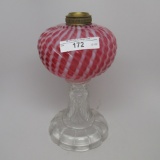 #1 stand lamp in Sheldon Swirl pattern with opal cranberry font clear stem