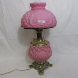 Beautiful pink satin Fleur de lys table lamp w/ polished brass hardware. A