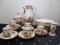 Porcelain tea service w/ 5 c/s sets, fruit bowl, sugar,  fork holder and ch