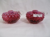 Pair Fenton cranberry opal candleholders deep rich color
