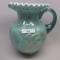 Fenton light teal irid cased Apple Tree pitcher