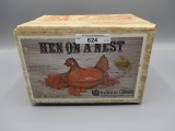 Indiana irid hen on nest in box
