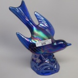 Blue carnival flying bird figurine