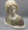 MArble bust of young woman w/ laced hat. 12 x 12