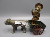 Cast Iron toy dog pulling apple cart w driver