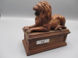 Lion on base, 6