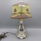 Pairpoint scenic dresser lamp as shown w/ ice chip shade.  Attributed to Pa