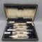 set of 5 utencils w/sterling band & mother of pearl handle in original case