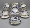 Set of 7 Early Years cobalt trimmed ramkins w/ underplates.