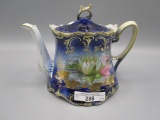 RS Prussia Cobalt teapot w/ waterlily decor and gold lilypads.