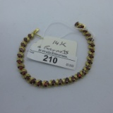 14K Gold bracelet w/ Garnetts