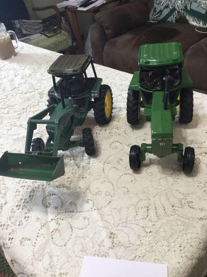 Two John Deere 1/16 scale tractors