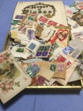 Old Cigar box lot Full of U.S. & Foreign stamps and Vintage Postcards
