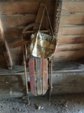 Old sled, water bag