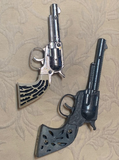 Two Toy Cap Guns