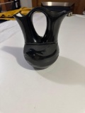 Black, pottery vessel