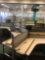 12 desk cubicle system with 1 Ergotron sit-stand integrated platform
