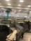 12 desk cubicle system with 1 Ergotron sit-stand integrated platform