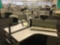 12 desk cubicle system with 1 Ergotron sit-stand integrated platform and 36 inch low storage cabinet