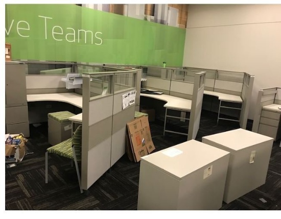 3 station managers cubicle center with privacy level walls and additional 60 inch workstation