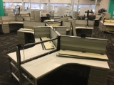 12 desk cubicle system with 1 Ergotron sit-stand integrated platform and 36 inch low storage cabinet