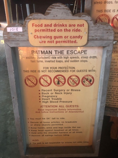 Batman the Escape ride safety instruction sign