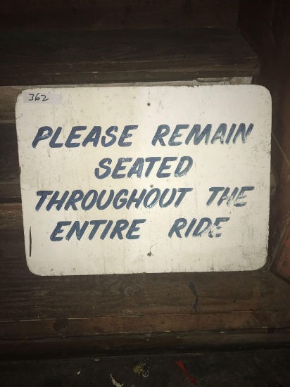 Please Remain Seated Sign