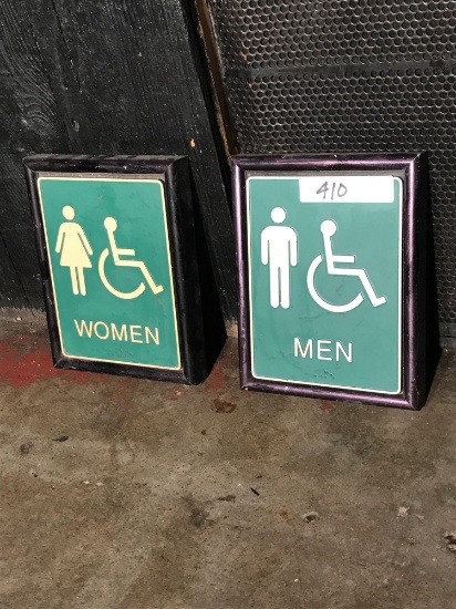 Women and Men Bathrooms Signs