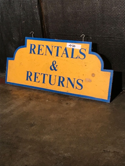 Rentals & Returns wooden sign