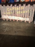 Captain Windy Henrys wooden fence sign