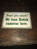 Forget your camera? 8in x 1ft 1/2in plastic sign