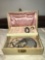 Vintage jewelry box with contents